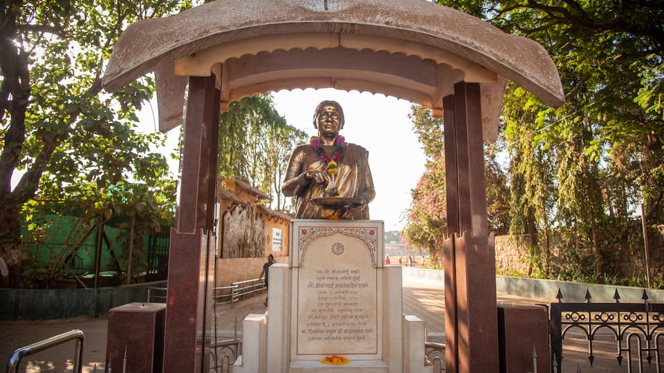 Shivaji Park which includes signage and a statue or sculpture