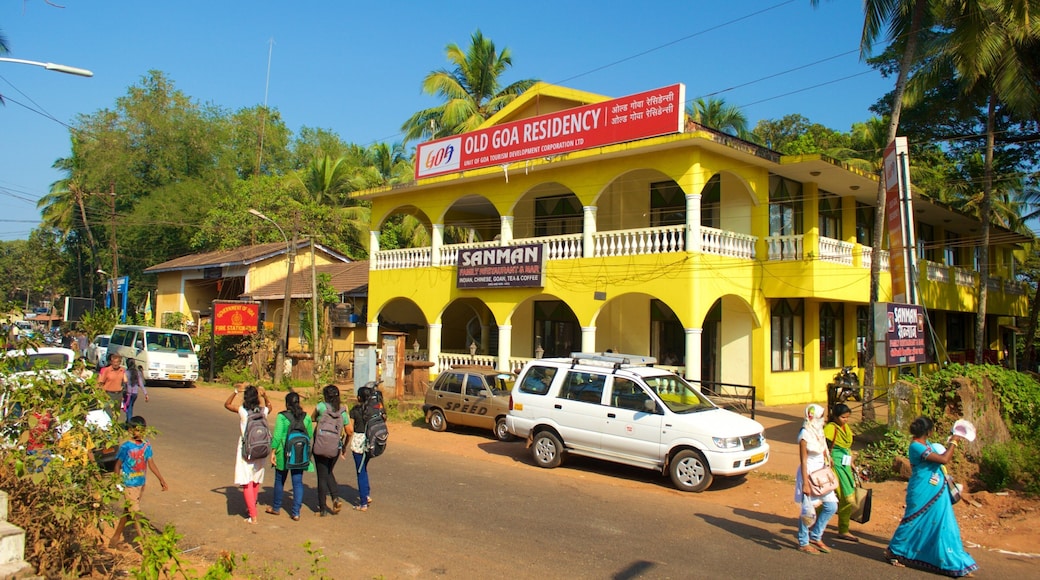 Basilica of Bom Jesus which includes a small town or village and tropical scenes