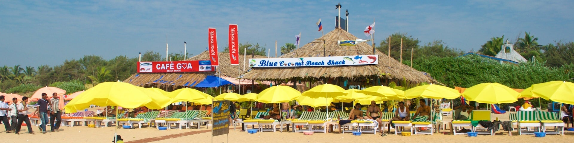 Calangute Beach which includes a sandy beach and a beach bar