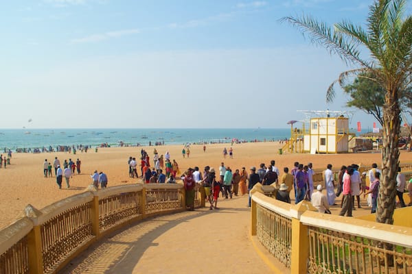 Calangute Beach featuring general coastal views and a beach as well as a large group of people