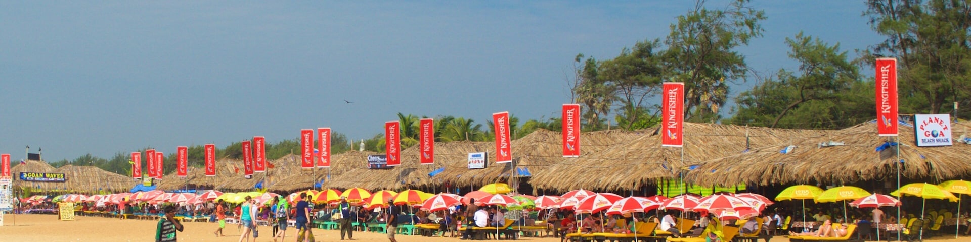 Calangute Beach featuring a beach bar and a beach