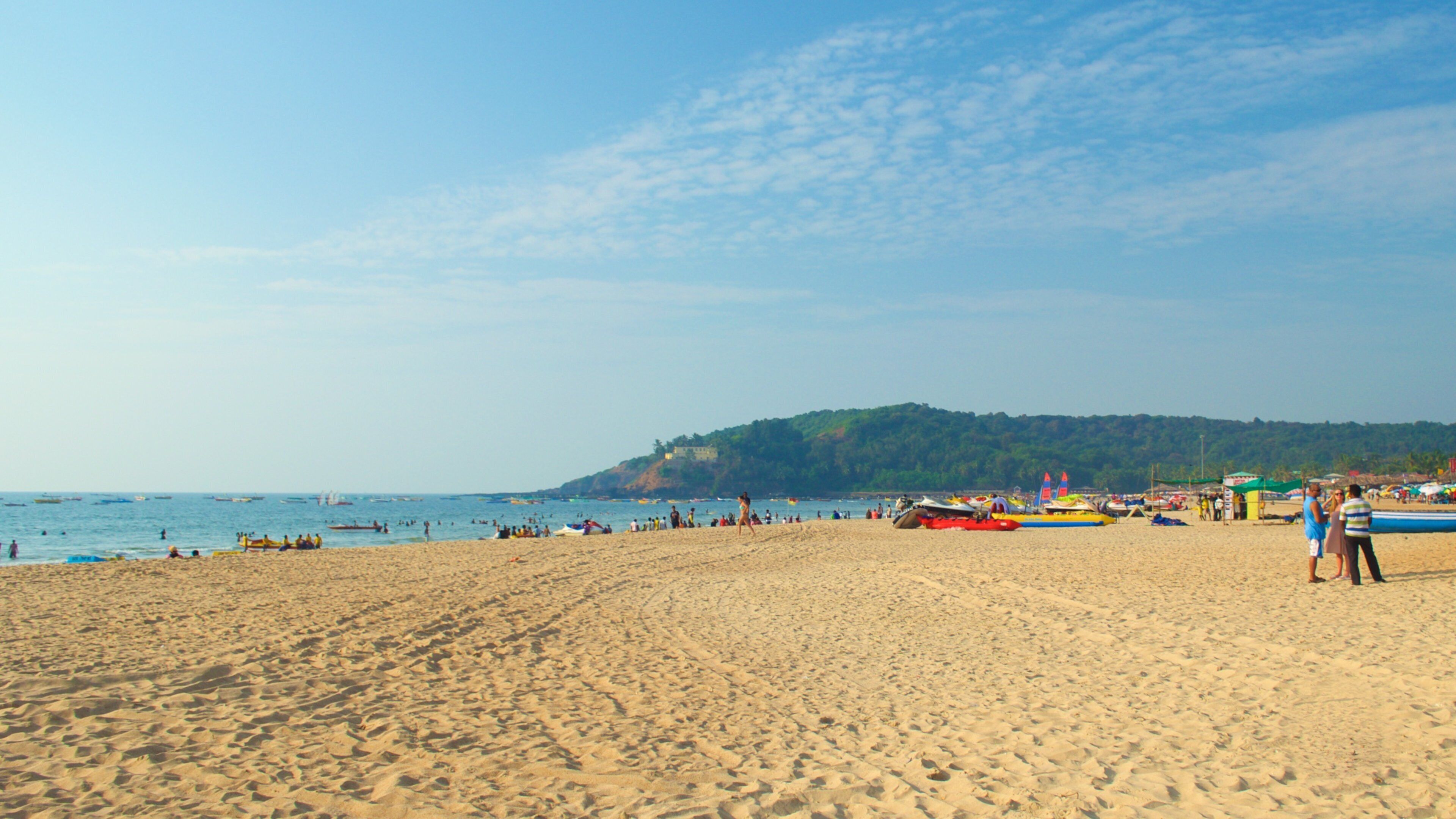 Baga Beach featuring a sandy beach and general coastal views