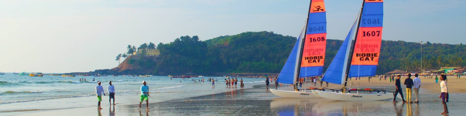 Baga Beach which includes sailing, a sandy beach and general coastal views