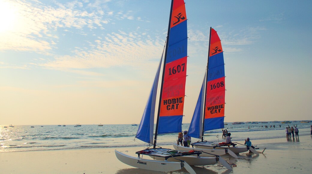 Baga Beach showing sailing, a beach and a sunset