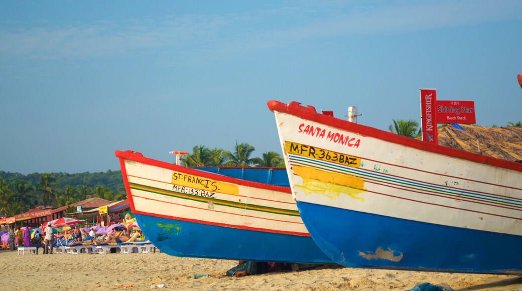 Playa de Baga ofreciendo una playa, vistas generales de la costa y paseos en lancha