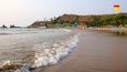 Arambol Beach which includes a sandy beach and a coastal town