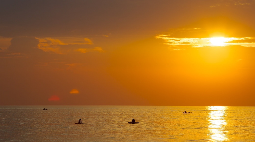Jimbaran Beach featuring a sunset and landscape views