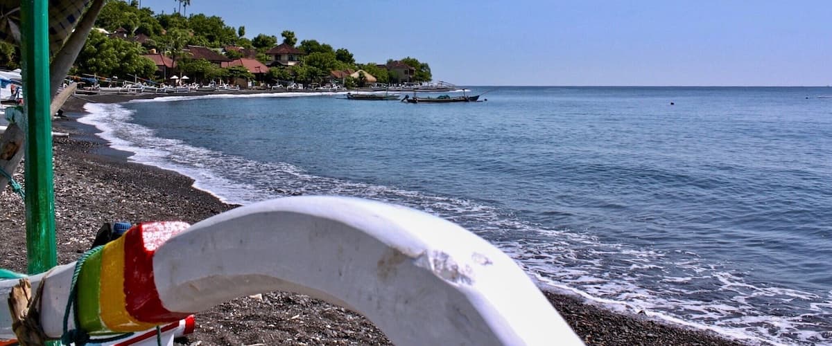 Amed Beach Indonesia ( Bali )
It’s quieter place of the island less crowded that the south with the black sand .
We are near from the volcano .
You can make of snorkel near the beach there is a nice seabed .
