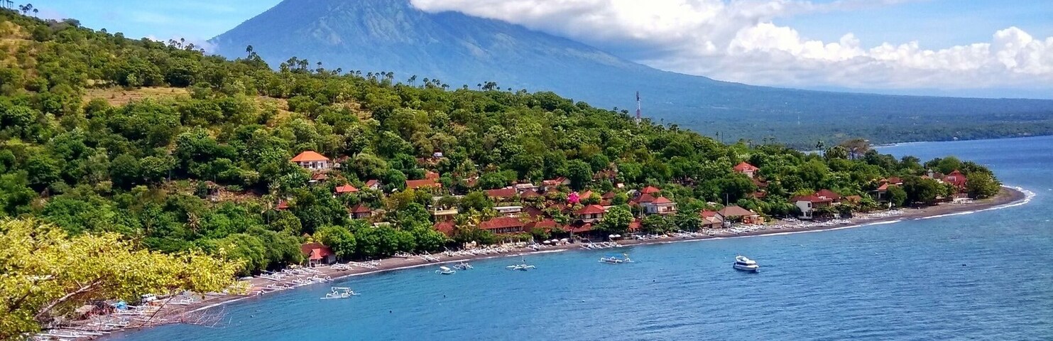 View of Amed beach with its crystal clear water.