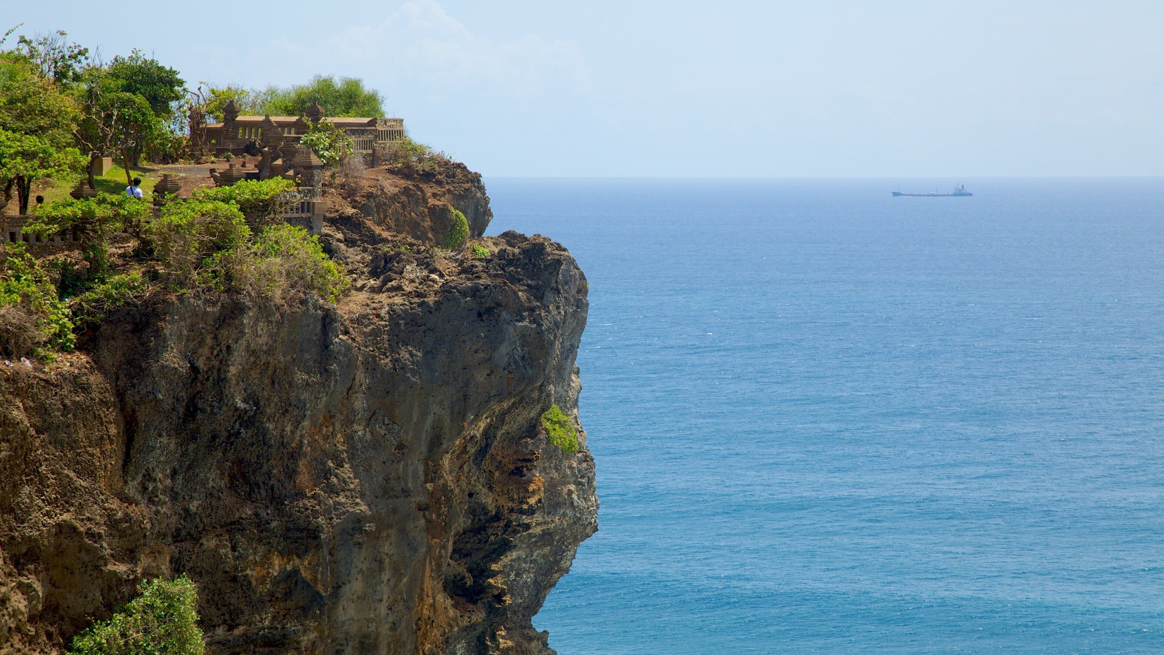 Uluwat Temple showing rugged coastline