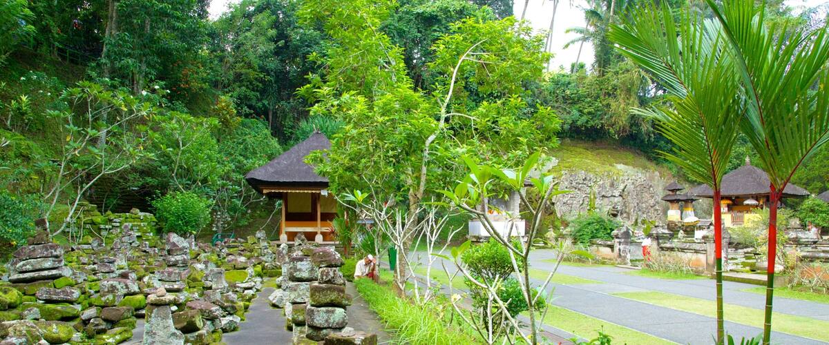 Goa Gajah which includes a temple or place of worship and a park