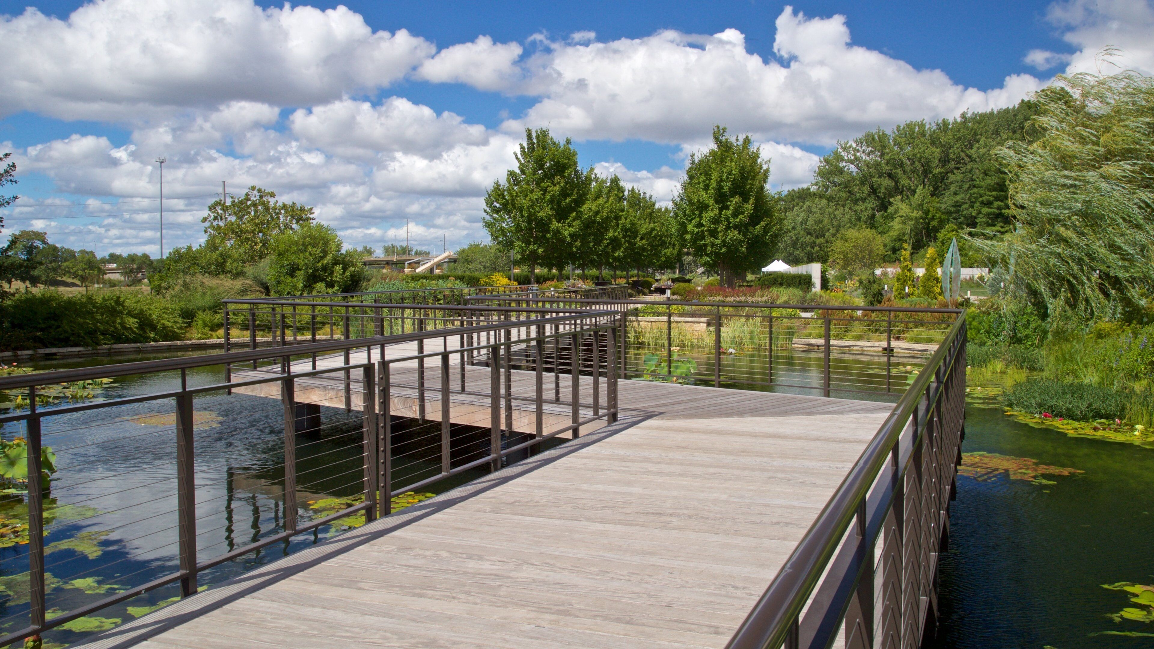 Greater Des Moines Botanical Garden which includes a bridge and a pond