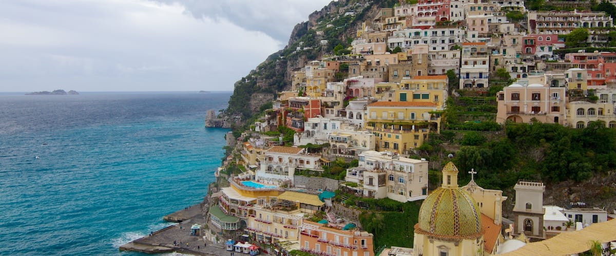 Church of Santa Maria Assunta which includes general coastal views, a coastal town and a city