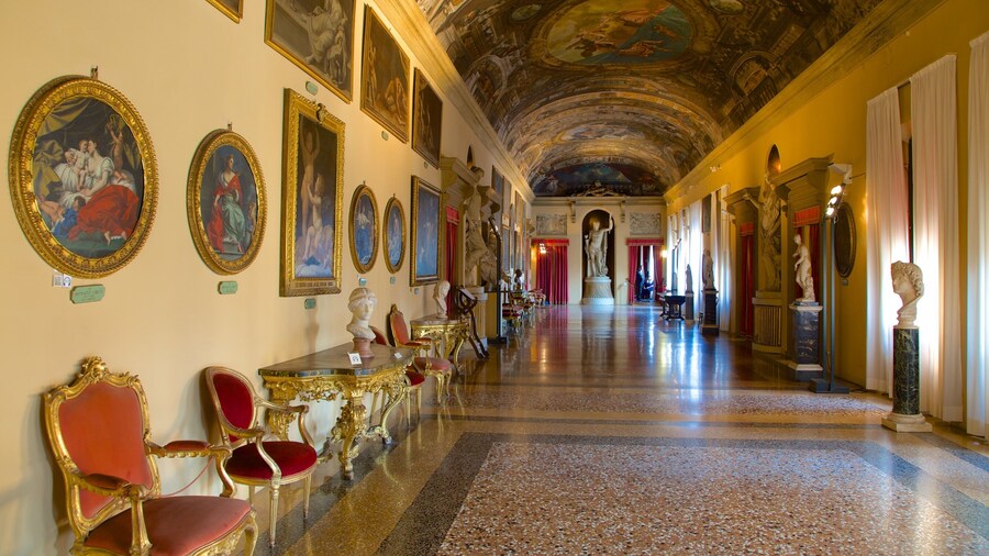 Palazzo Comunale which includes art, interior views and château or palace