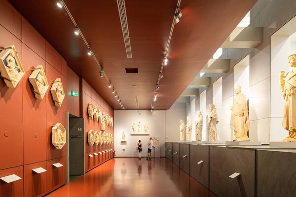Museo dell\'Opera del Duomo showing interior views and a statue or sculpture