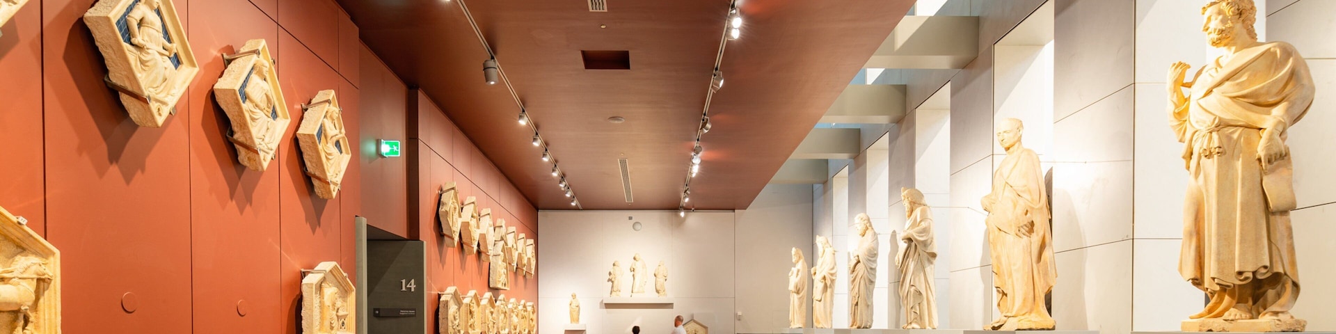 Museo dell\'Opera del Duomo showing interior views and a statue or sculpture
