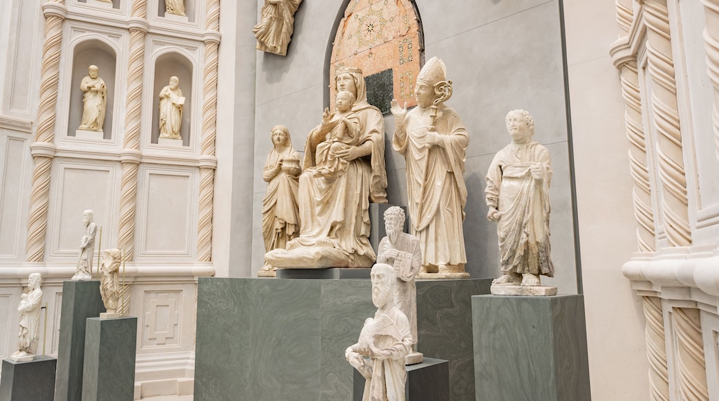 Museo dell\'Opera del Duomo featuring religious elements, a statue or sculpture and interior views