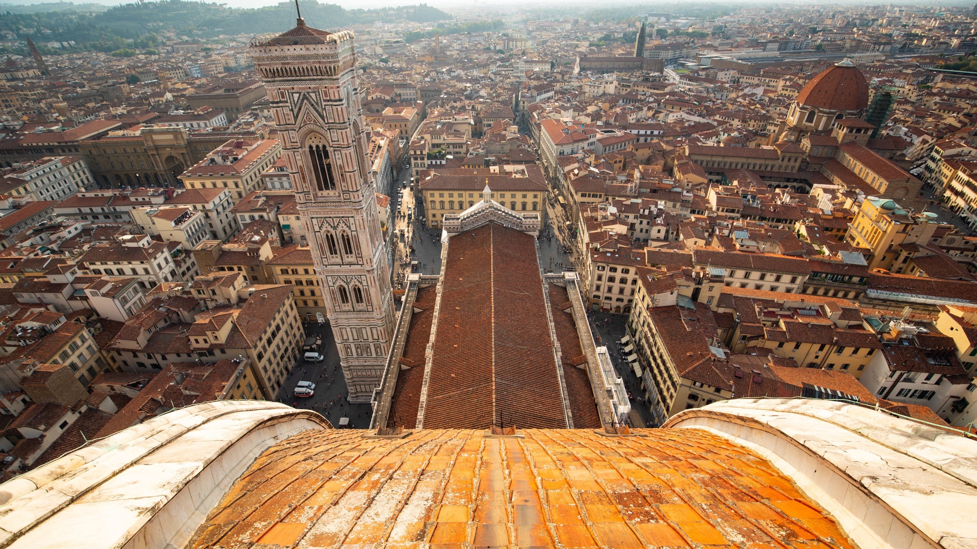 Giotto\'s Campanile which includes landscape views and a city
