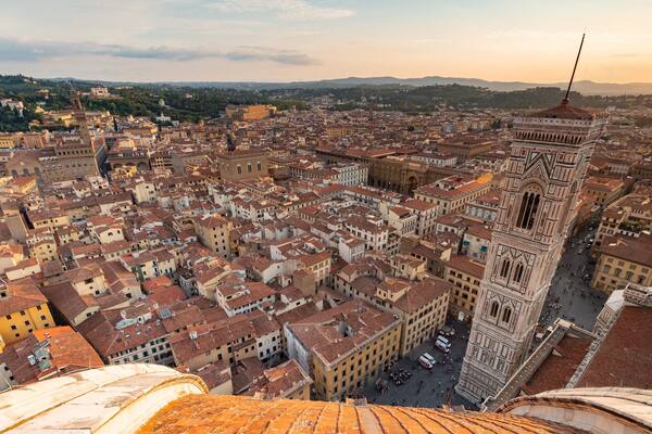 Giotto\'s Campanile featuring a city, a sunset and landscape views
