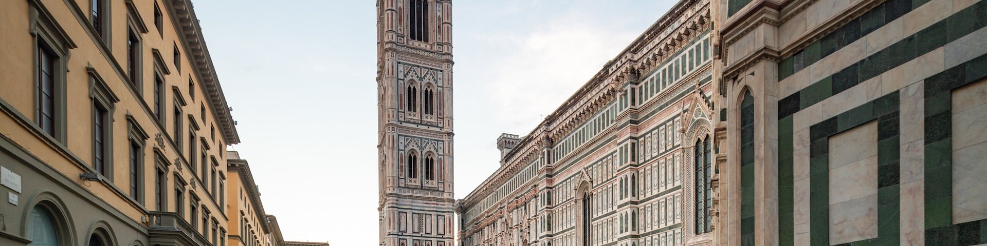 Giotto\'s Campanile showing street scenes, a city and heritage architecture