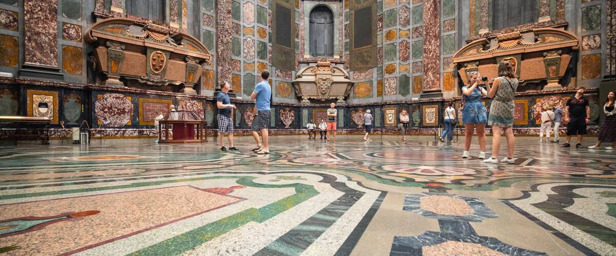 Medici Chapels which includes interior views and heritage elements as well as a small group of people