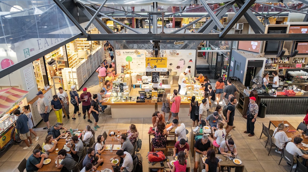 Central Market featuring interior views and dining out as well as a large group of people
