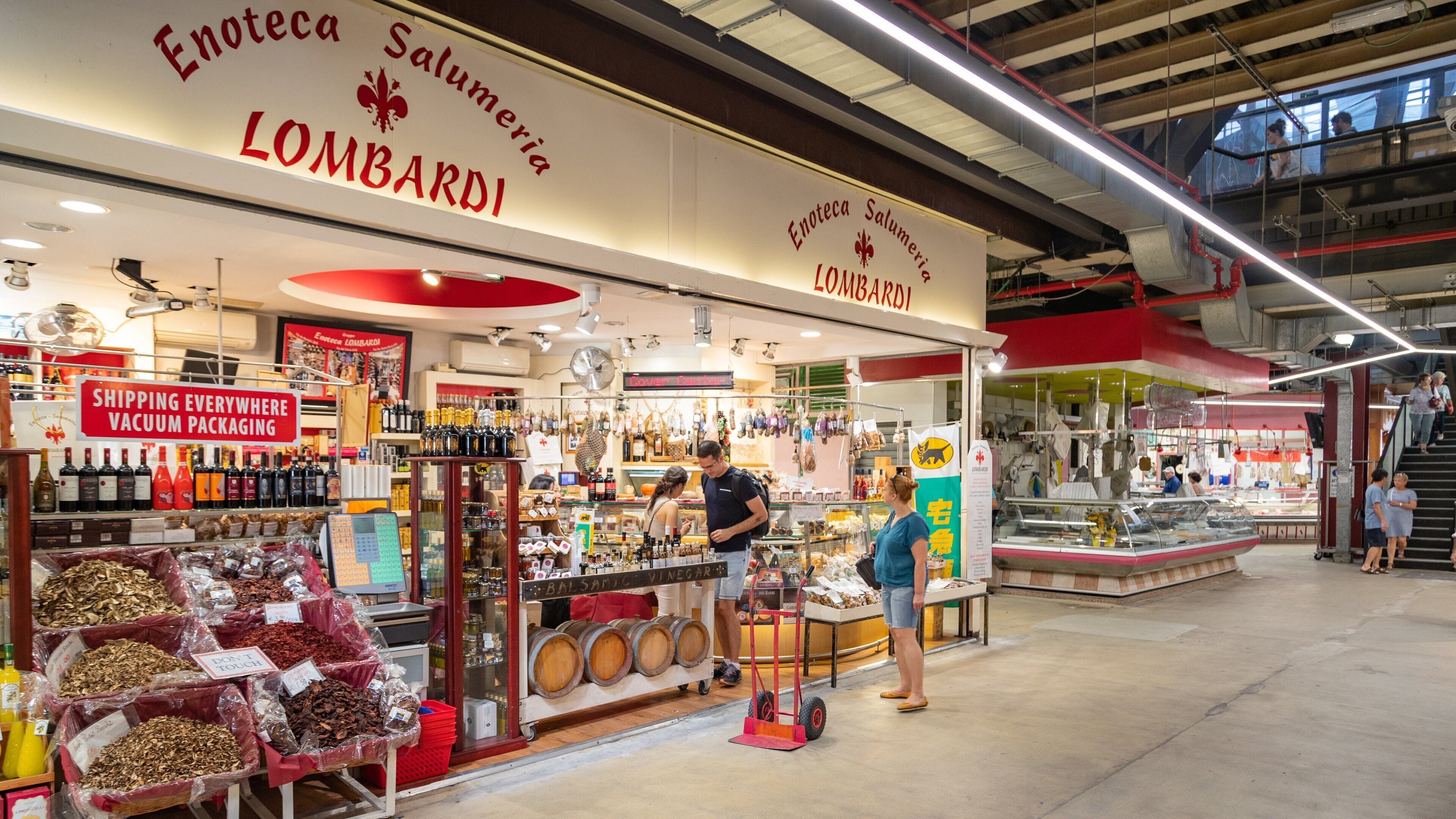 A store named Enoteca Salumeria Lombardi with a variety of products like wine and dried fruits.