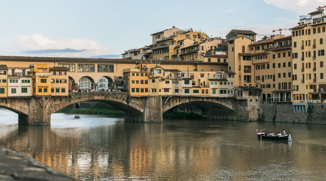 Ponte Vecchio showing a bridge, boating and a river or creek