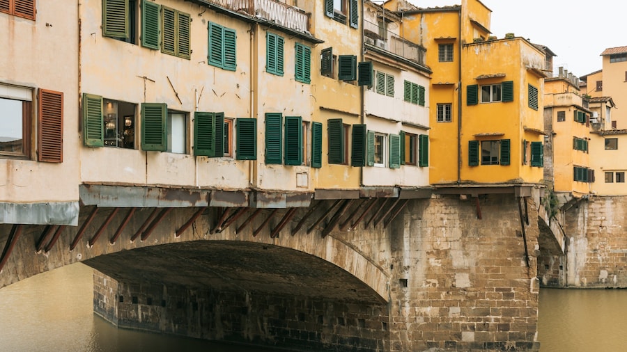 Ponte Vecchio showing a bridge and a river or creek