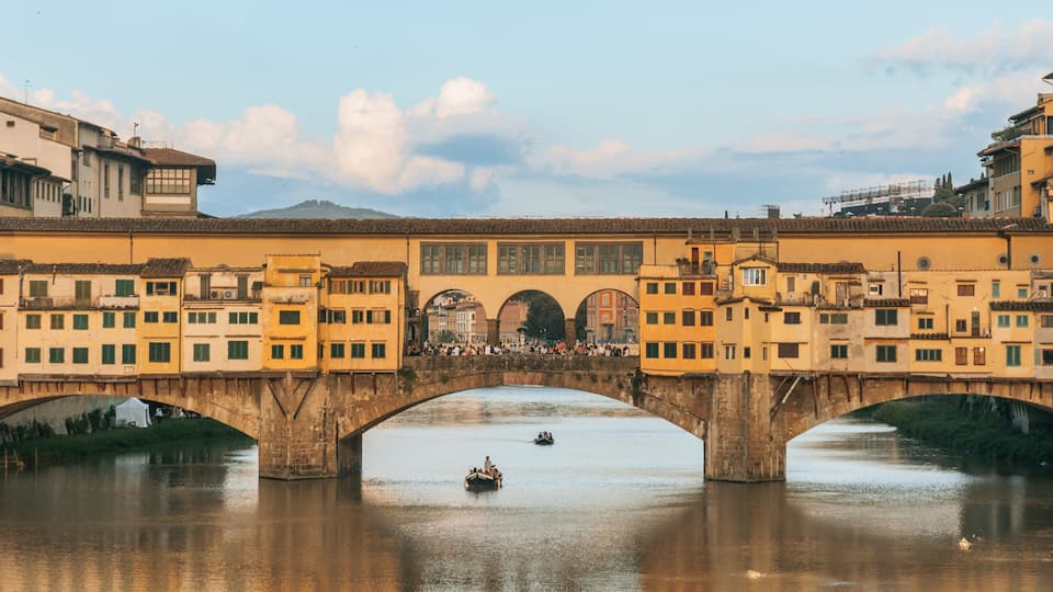 Ponte Vecchio showing a bridge and a river or creek