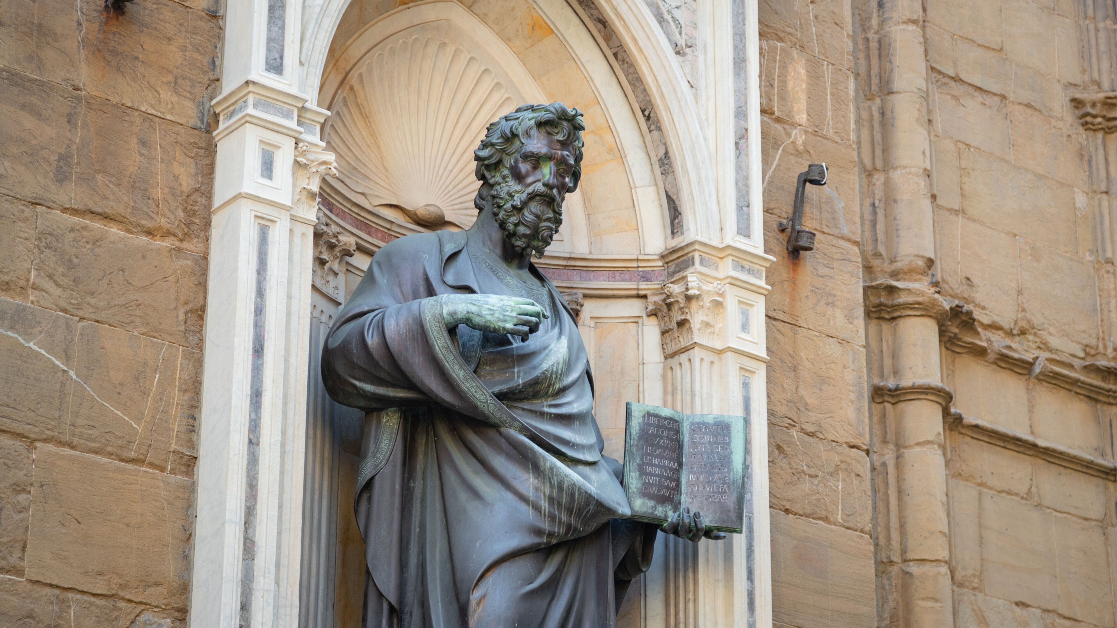 Orsanmichele which includes heritage elements and a statue or sculpture