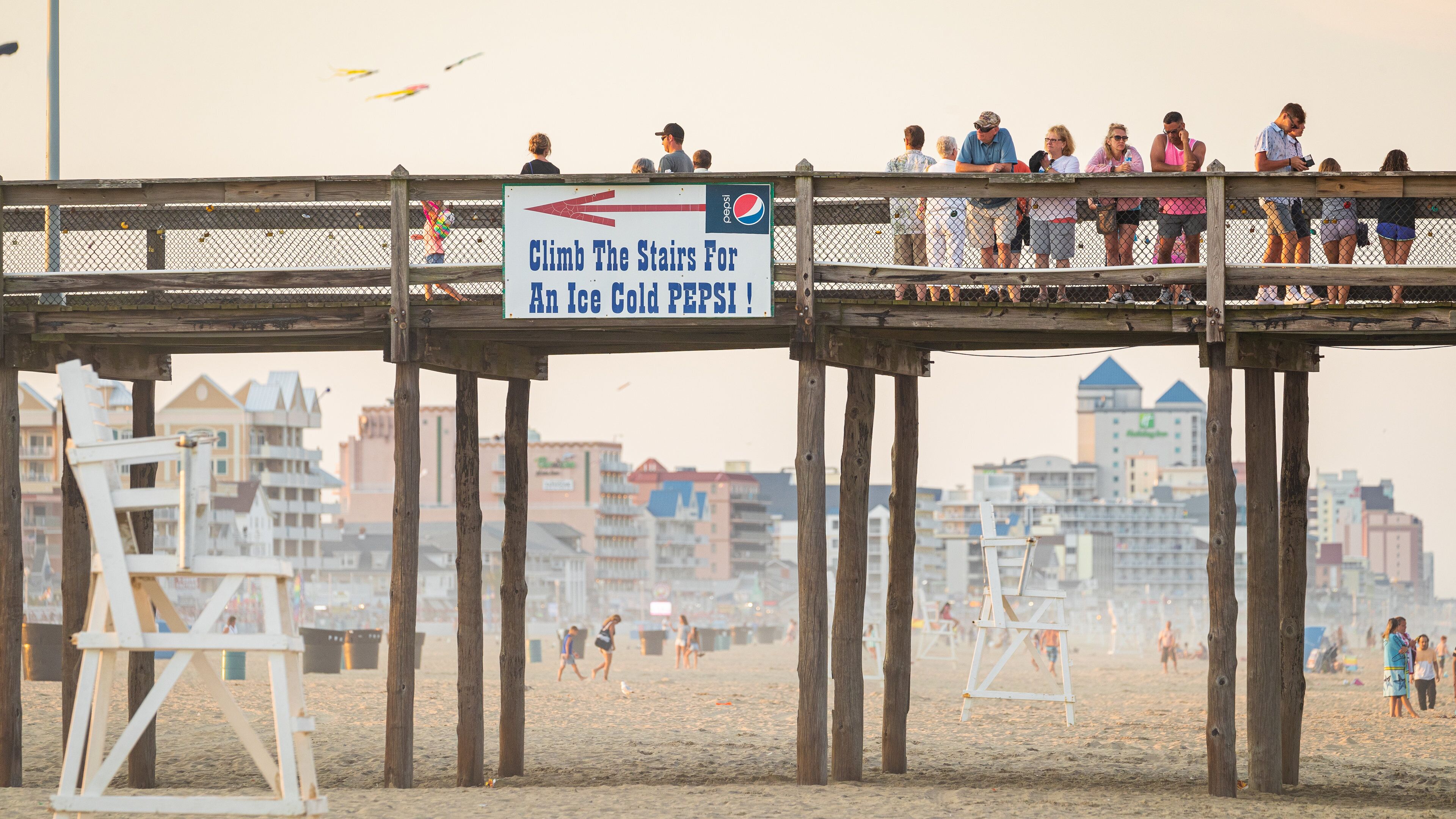 Ocean City Beach showing a beach, signage and general coastal views