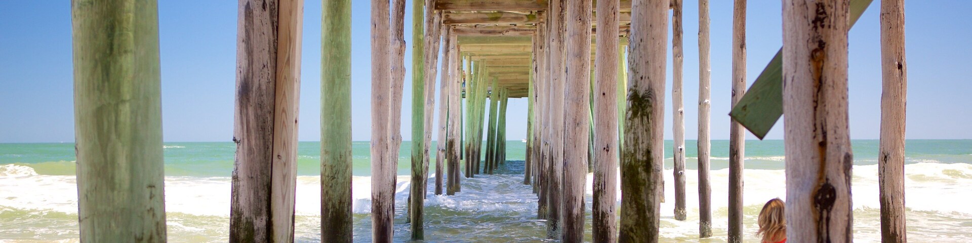 Ocean City Beach showing a sandy beach and general coastal views as well as an individual child