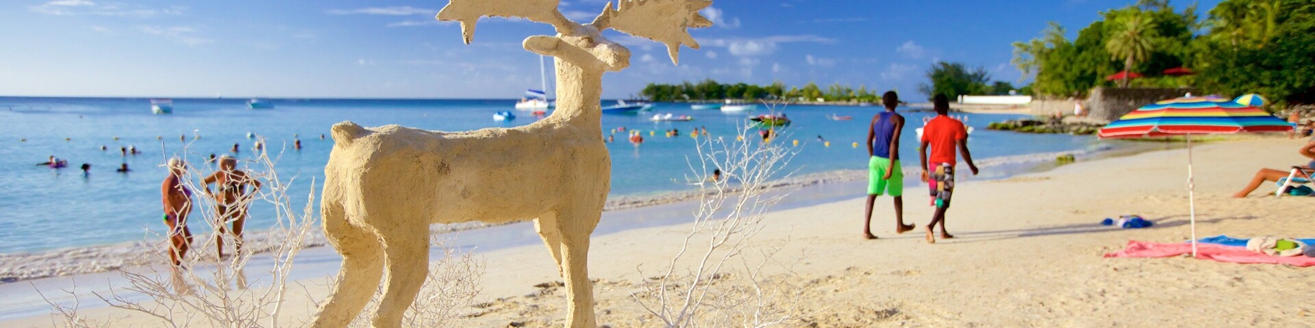 Mauritius featuring a sandy beach and outdoor art