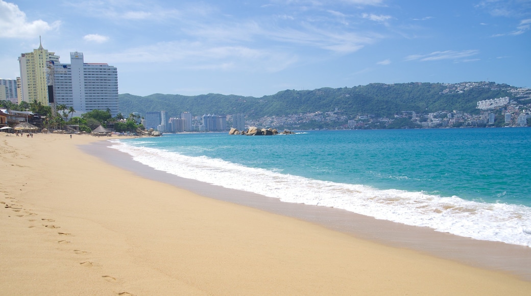 Condesa Beach showing a beach and a coastal town