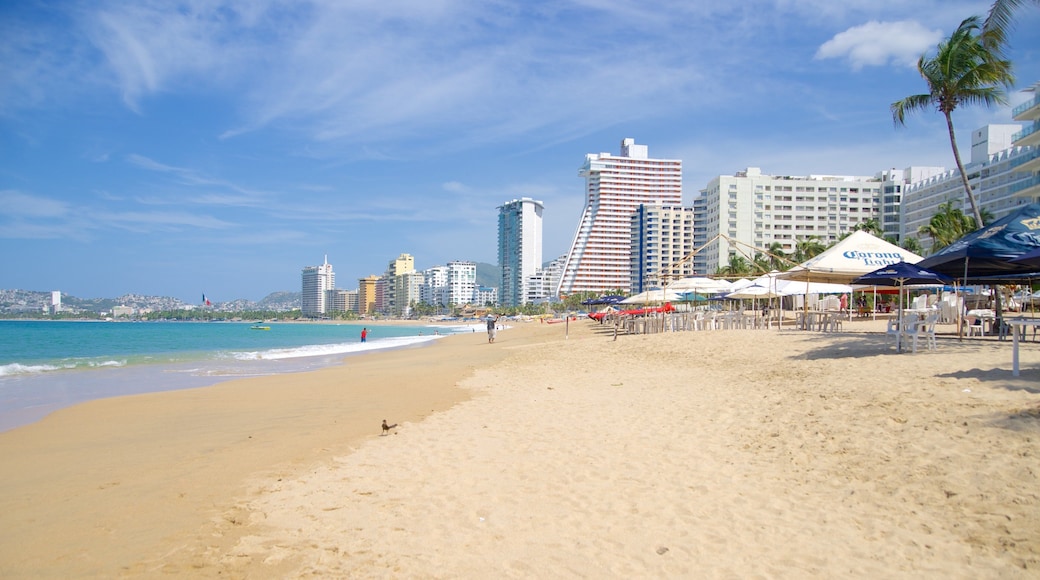Condesa Beach featuring a coastal town and a beach