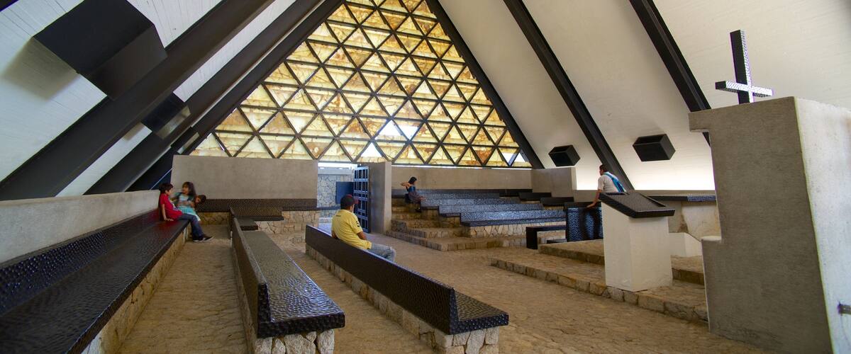 Capilla de la Paz featuring a church or cathedral, religious elements and interior views