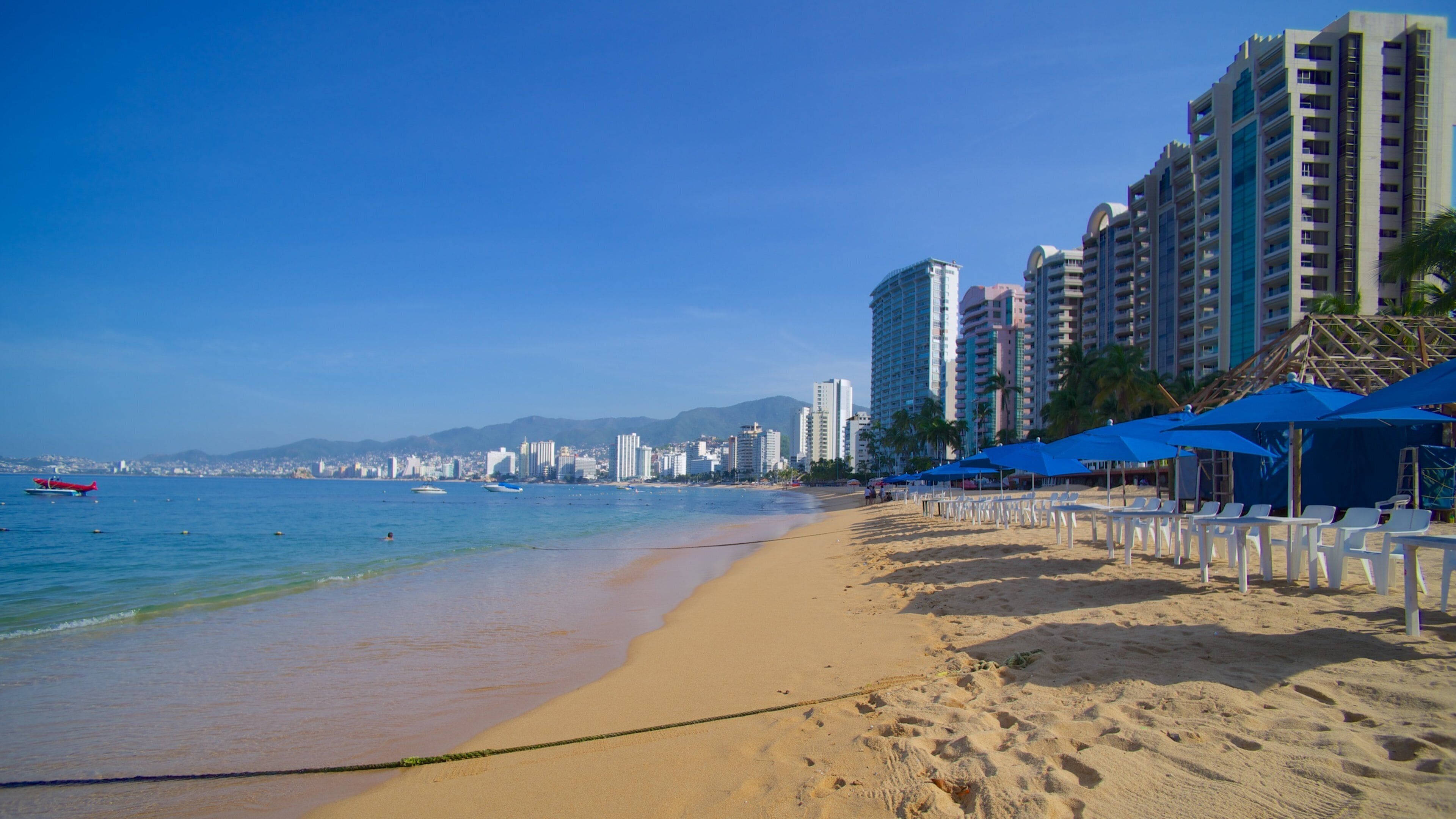 Icacos Beach featuring a city and a beach
