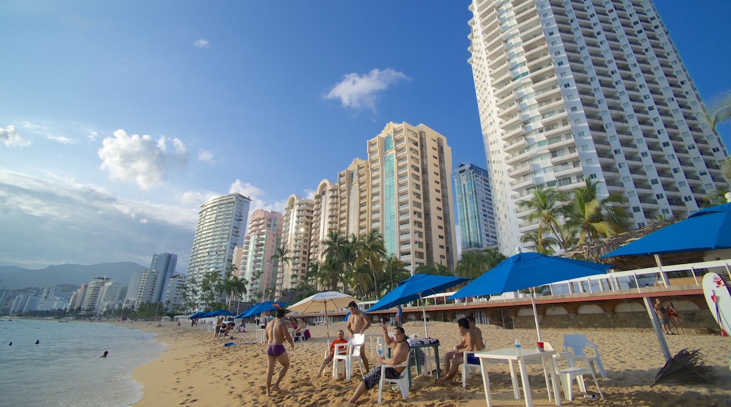 Icacos Beach featuring a sandy beach, a coastal town and a city