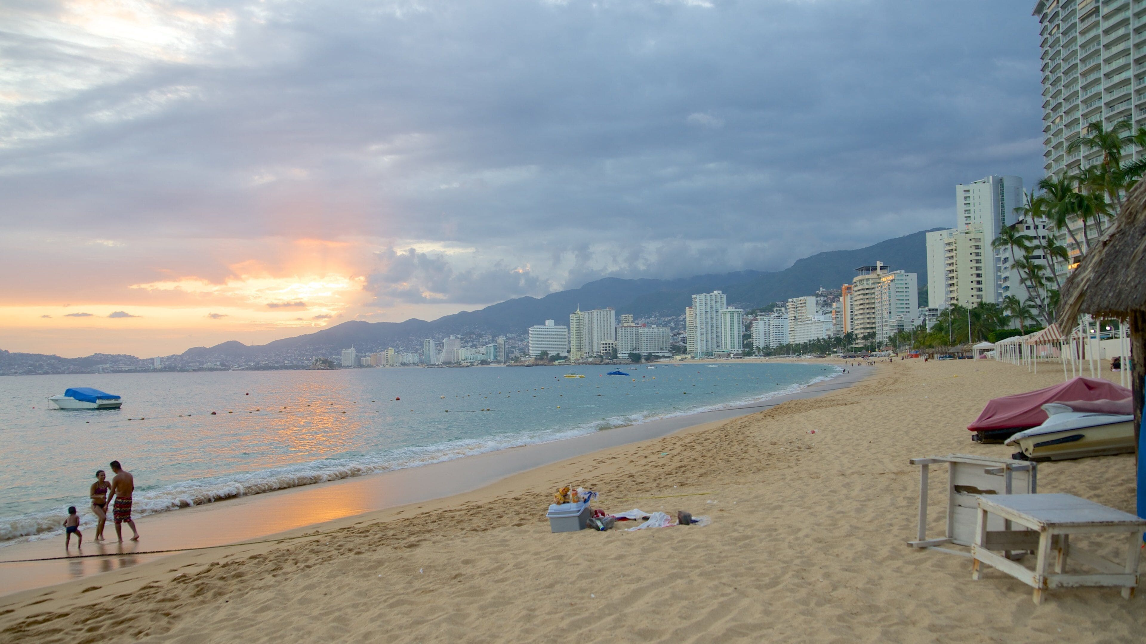 Icacos Beach showing a coastal town and a sandy beach