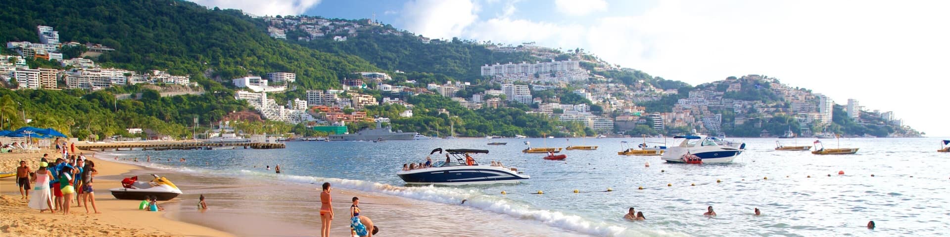 Icacos Beach showing a bay or harbor, a sandy beach and general coastal views