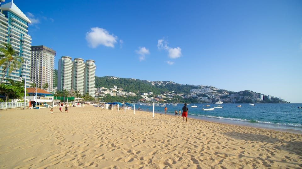 Icacos Beach featuring a beach, a coastal town and a city