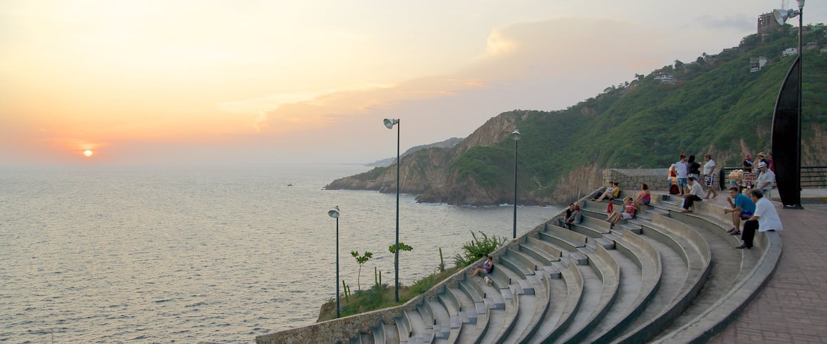 Sinfonia which includes general coastal views, a sunset and views