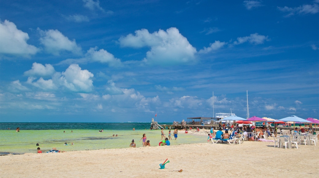 Langosta Beach showing swimming, general coastal views and a sandy beach