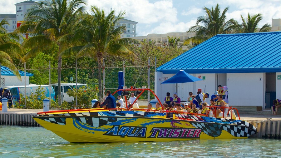 Aquaworld which includes signage and boating as well as a small group of people