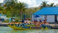 Aquaworld which includes signage and boating as well as a small group of people