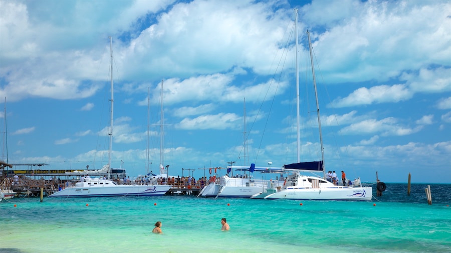 Playa Tortuga featuring a bay or harbor, swimming and general coastal views