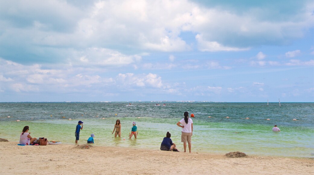 Playa Tortugas showing a beach, swimming and general coastal views
