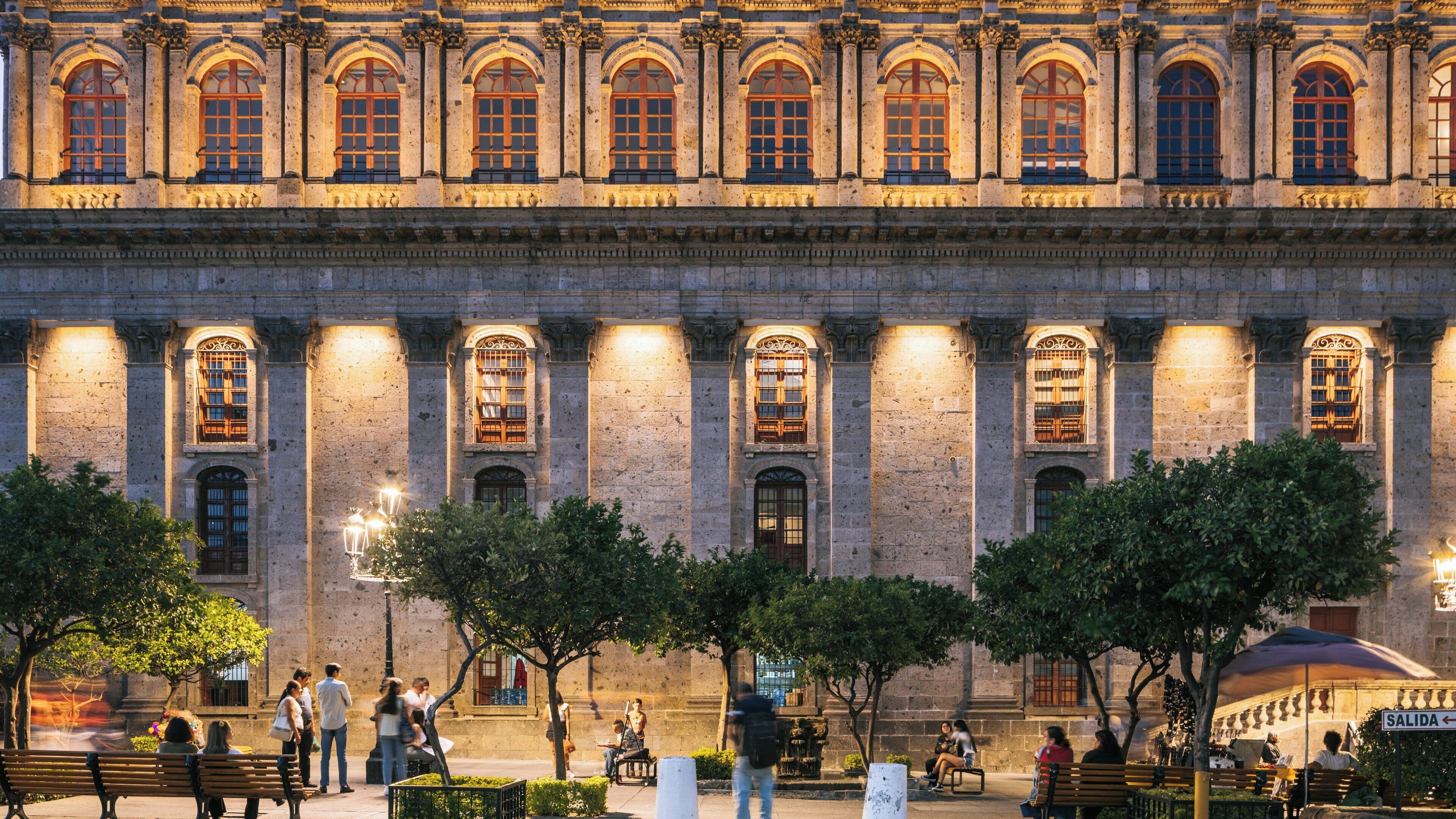 Historic Degollado Theater illuminated at night in Downtown Guadalajara showcasing vibrant cultural atmosphere