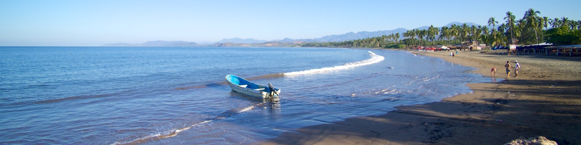 Avenida Kukulkan showing a beach and general coastal views